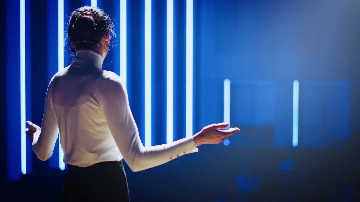 A speaker addressing a company gathering