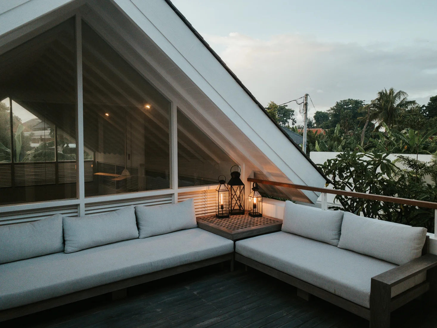 A quiet contemporary terrace beneath a sloping roof
