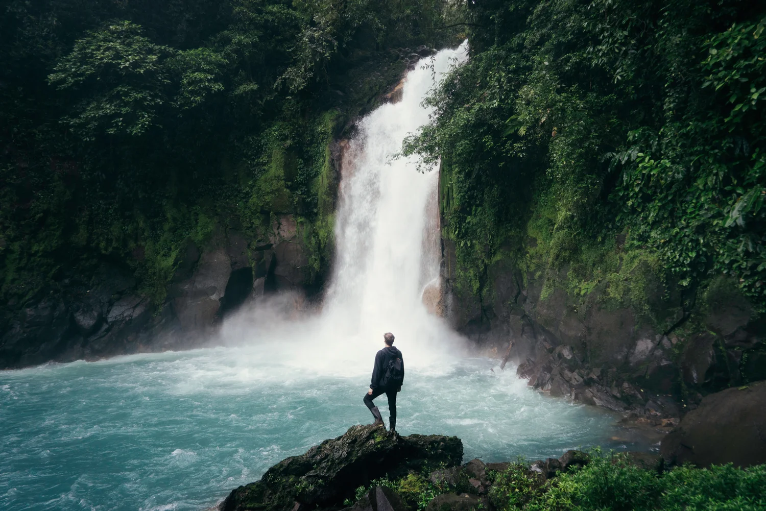 A waterfall framed by tropical forest