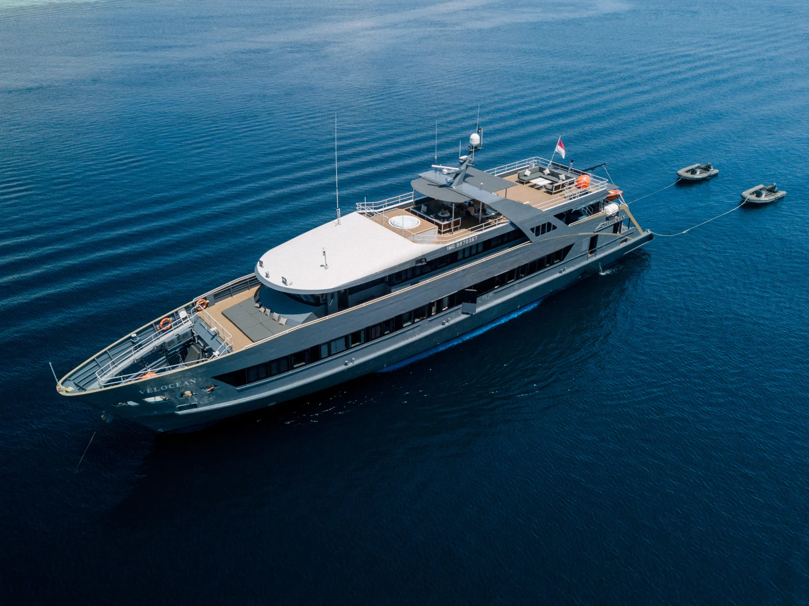 A yacht surrounded by open blue water
